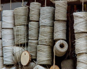 View at aged strings in bobbins at outdoor