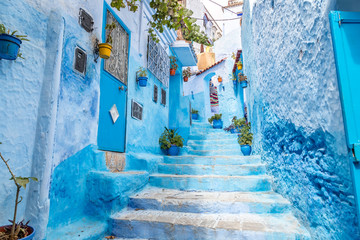 Stairway in the beautiful street of blue medina in city Chefchaouen