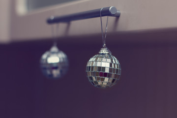Mirror spheres hanging on furniture handles