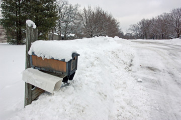 A Mail Box Nearly Buried in Deep Snow