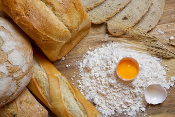 Baking bread, flour products.Flour, egg and wheat ears.