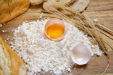 Baking bread, flour products.Flour, egg and wheat ears.