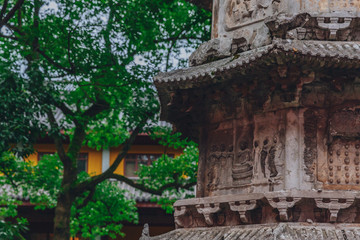 Close-up of relief sculpture on ancient pagoda in Lingyin Temple, Hangzhou, China