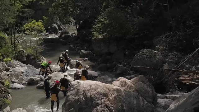 people canyoning through a river in chateauroux des alpes