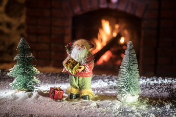 Christmas Room Interior Design, Xmas Tree Decorated By Lights Presents Gifts Toys, Candles And Garland Lighting Indoors Fireplace