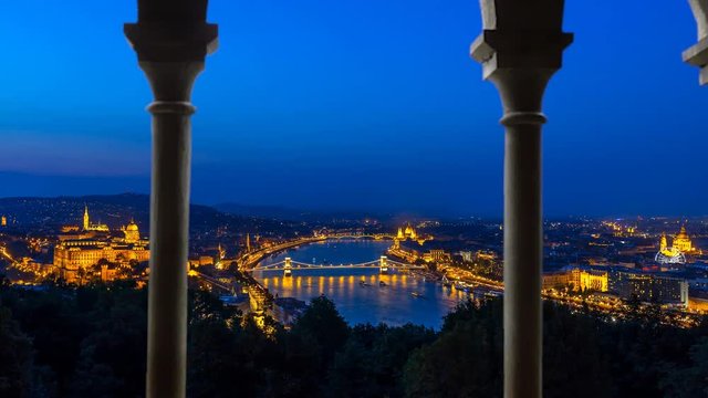 Budapest skyline aerial view from day o night timelapse view from old window balcony.