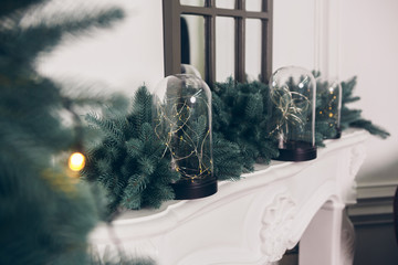 christmas tree decor toys. New Year's interior. Fireplace whit bulbs Christmas decor