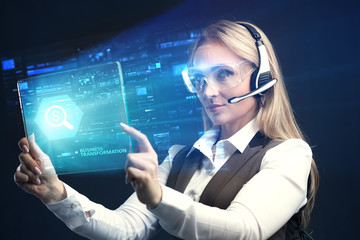 The concept of business, technology, the Internet and the network. A young entrepreneur working on a virtual screen of the future and sees the inscription: Business transformation
