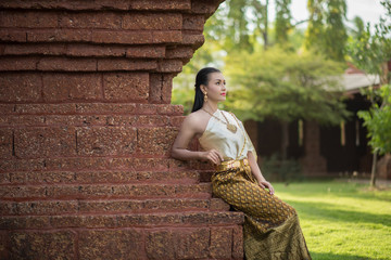 Beautiful Woman wearing typical Thai dress