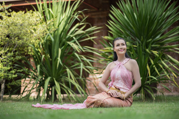 Beautiful Woman wearing typical Thai dress