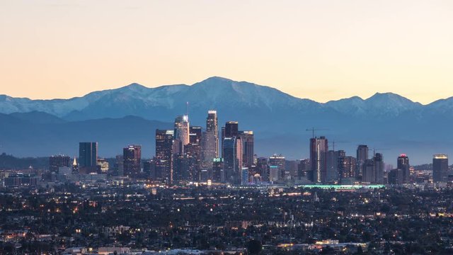 Downtown Los Angeles With Snowy Mountains at Sunrise Timelapse