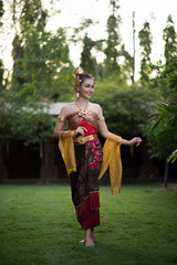 Beautiful Woman wearing typical Thai dress