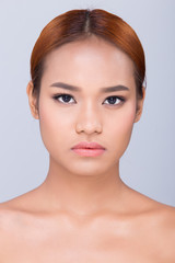 Obraz premium Clean Skin Woman straight black hair with Smooth pose open shoulder smile