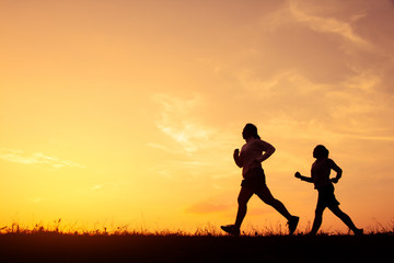 Obraz na płótnie Canvas Jogging girl for health silhouette, Concept run for health.