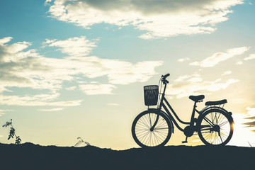 Fototapeta na wymiar Silhouette of bicycle parking on mountain