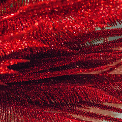 Red glitter texture christmas background.