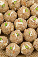 Indian Traditional Sweet Food Urad Dal Laddu Also Know as Laddoo, Ladoo, Laddo are Ball-Shaped Sweets Made of Butter, Dry Fruits, Fenugreek and other Spices. Urad Dal laddu Sweet Mostly Eat in Winter