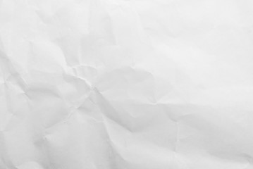 Obraz premium White crumpled paper texture background. Close-up.