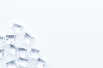 ice cubes on white kitchen table top view mock up