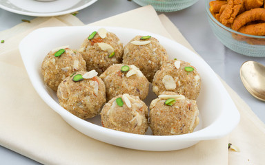 Indian Traditional Sweet Food Urad Dal Laddu Also Know as Laddoo, Ladoo, Laddo are Ball-Shaped Sweets Made of Butter, Dry Fruits, Fenugreek and other Spices. Urad Dal laddu Sweet Mostly Eat in Winter