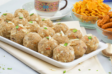 Indian Traditional Sweet Food Urad Dal Laddu Also Know as Laddoo, Ladoo, Laddo are Ball-Shaped Sweets Made of Butter, Dry Fruits, Fenugreek and other Spices. Urad Dal laddu Sweet Mostly Eat in Winter