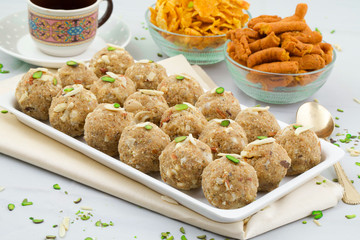 Indian Traditional Sweet Food Urad Dal Laddu Also Know as Laddoo, Ladoo, Laddo are Ball-Shaped Sweets Made of Butter, Dry Fruits, Fenugreek and other Spices. Urad Dal laddu Sweet Mostly Eat in Winter