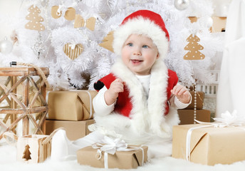 Pretty little girl dressed as Santa