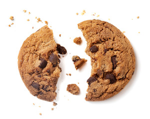 Chocolate chip cookie with crumbs isolated on white background..