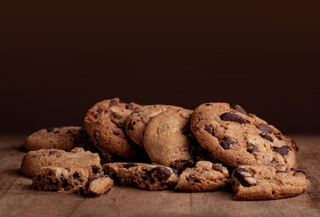 Chocolate chip cookies  on old wood table. Copyspace