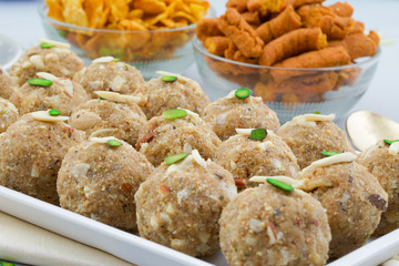 Indian Traditional Sweet Food Urad Dal Laddu Also Know as Laddoo, Ladoo, Laddo are Ball-Shaped Sweets Made of Butter, Dry Fruits, Fenugreek and other Spices. Urad Dal laddu Sweet Mostly Eat in Winter