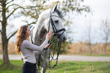 woman with a horse for a walk
