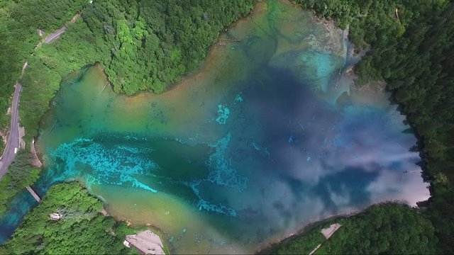 Astonishing aerial shot over a picturesque lake