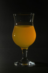 Orange drink in a cocktail glass