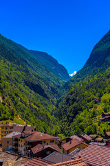 Fototapeta na wymiar Swiss Alps village in mountains valley, Stalden, Staldenried, Vi