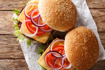 organic vegetarian burger with mushrooms patty, vegetables and cheddar cheese close-up. horizontal top view