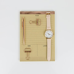 stationary with watch in white background