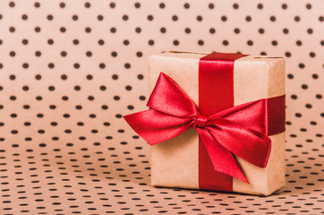 Obraz premium Gift box with a red bow. Gift with red ribbon. Copy space