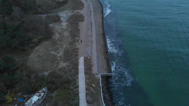 Aerial view of Hel Peninsula coastline and wreck of WLA-55 cutter. Bay of Puck, Poland, Europe.