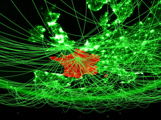 France on green model of planet Earth with network representing green age, travel and communication.