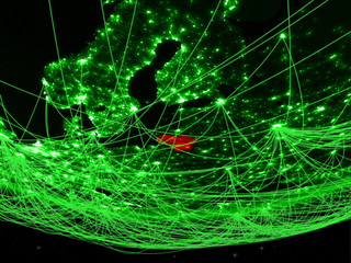 Lithuania on green model of planet Earth with network representing green age, travel and communication.