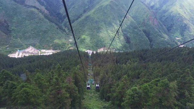 Cool shot from a gondola of a beautiful mountainous area in China