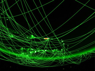 Puerto Rico on green model of planet Earth with network representing green age, travel and communication.