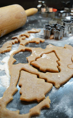 Process of baking gingerbread christmas cookies at home. Cutting tools