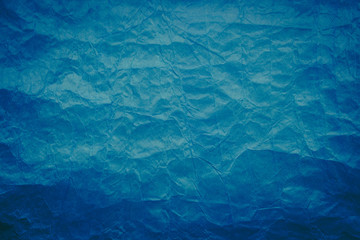 Crumpled blue paper background. Paper texture.