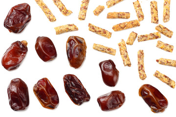 date fruit with granola breakfast isolated on white background. top view