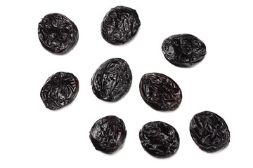 Dried plums - prunes isolated on white background. top view