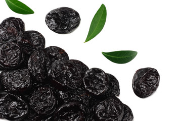 Dried plums - prunes with green leaves isolated on white background. top view