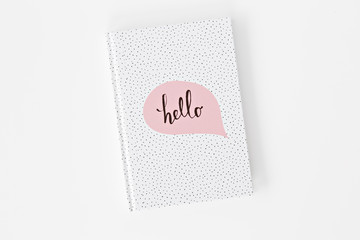 white notebook in white background