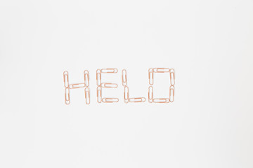 word hello spelled with paperclips