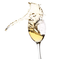 Glass with splashing wine on white background